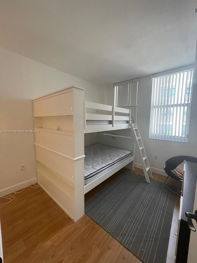 4100 Salzedo St Unit 809, Coral Gables, FL 33146 - bedroom featuring wood finished floors and baseboards