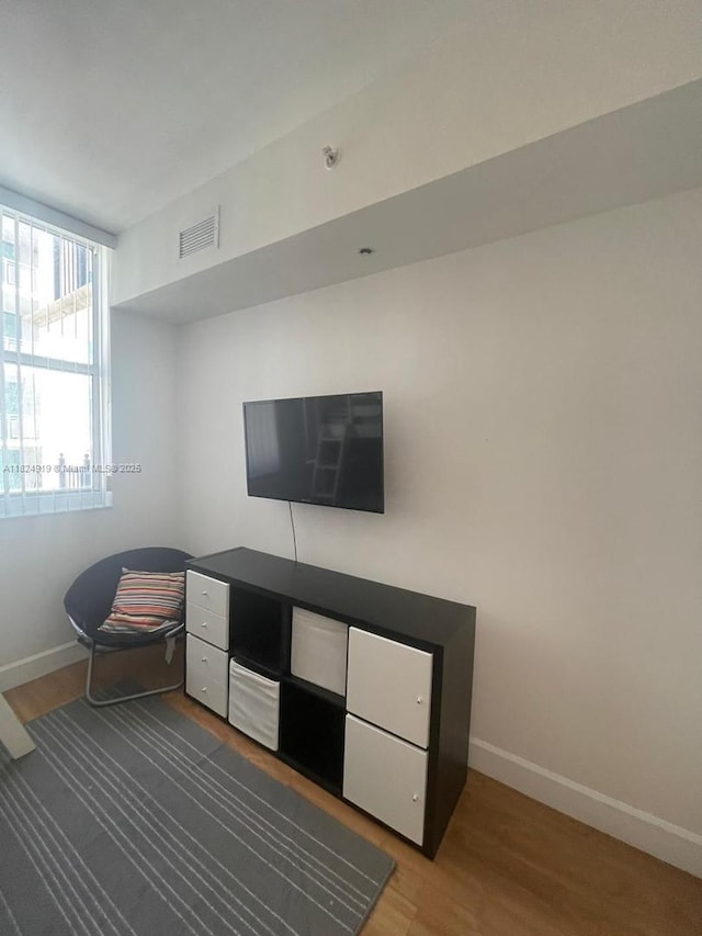 4100 Salzedo St Unit 809, Coral Gables, FL 33146 - living room with wood finished floors and an office area