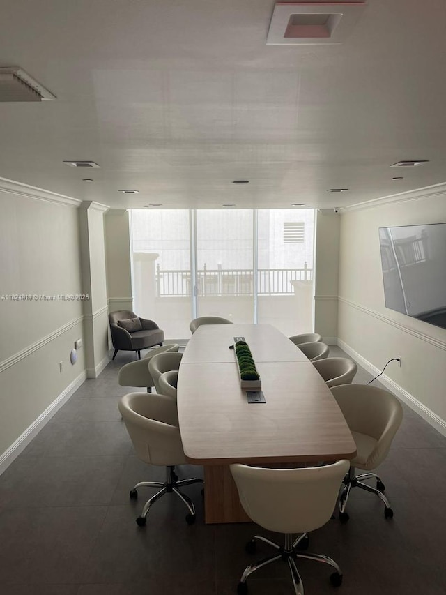 4100 Salzedo St Unit 809, Coral Gables, FL 33146 - dining space with crown molding and a desk