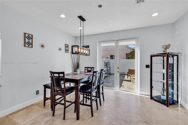20709 NW 1st St, Pembroke Pines, FL 33029 - dining space featuring a textured ceiling, french doors, and recessed lighting