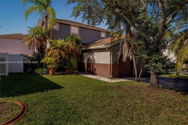 20709 NW 1st St, Pembroke Pines, FL 33029 - rear view of property with stucco siding, an attached garage, and driveway