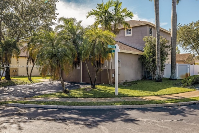 20709 NW 1st St, Pembroke Pines, FL 33029 - view of front facade featuring driveway and stucco siding