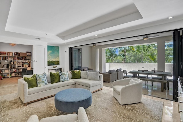 718 Valencia Ave Unit 204, Coral Gables, FL 33134 - living area with a tray ceiling and plenty of natural light
