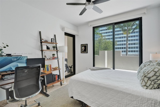 718 Valencia Ave Unit 204, Coral Gables, FL 33134 - bedroom with an office area, a ceiling fan, and access to exterior
