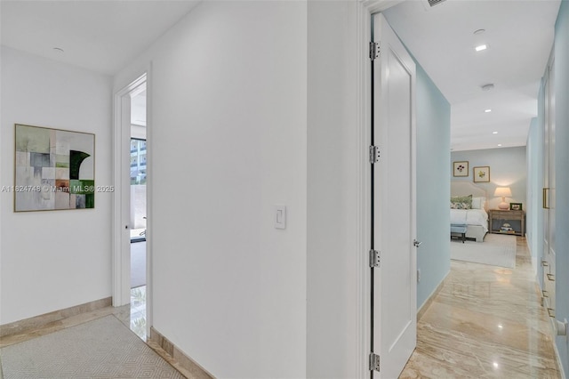 718 Valencia Ave Unit 204, Coral Gables, FL 33134 - hallway featuring light marble finish flooring and recessed lighting