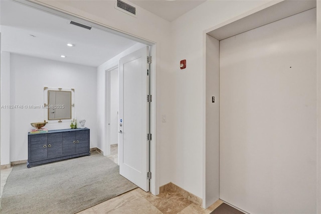 718 Valencia Ave Unit 204, Coral Gables, FL 33134 - hallway featuring baseboards and elevator
