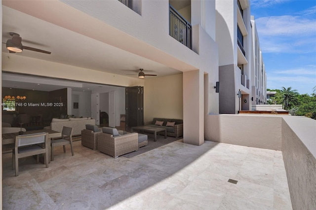 718 Valencia Ave Unit 204, Coral Gables, FL 33134 - view of patio with ceiling fan and an outdoor hangout area