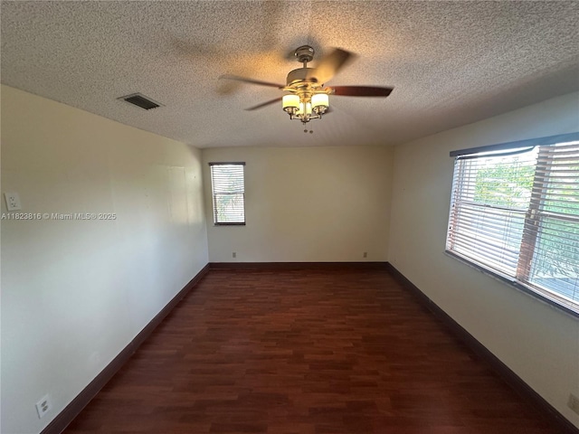 2660 Huron Way, Miramar, FL 33025 - spare room with a textured ceiling, dark wood-style floors, and ceiling fan