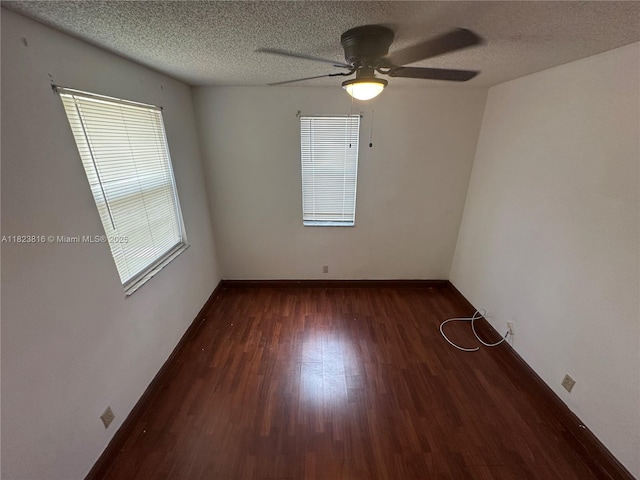 2660 Huron Way, Miramar, FL 33025 - spare room with dark wood-style flooring, ceiling fan, and a textured ceiling