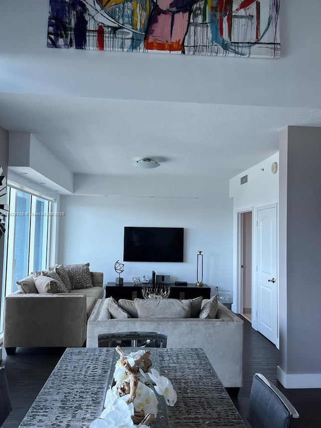 60 SW 13th St Unit 4607, Miami, FL 33130 - living area with dark wood finished floors and baseboards