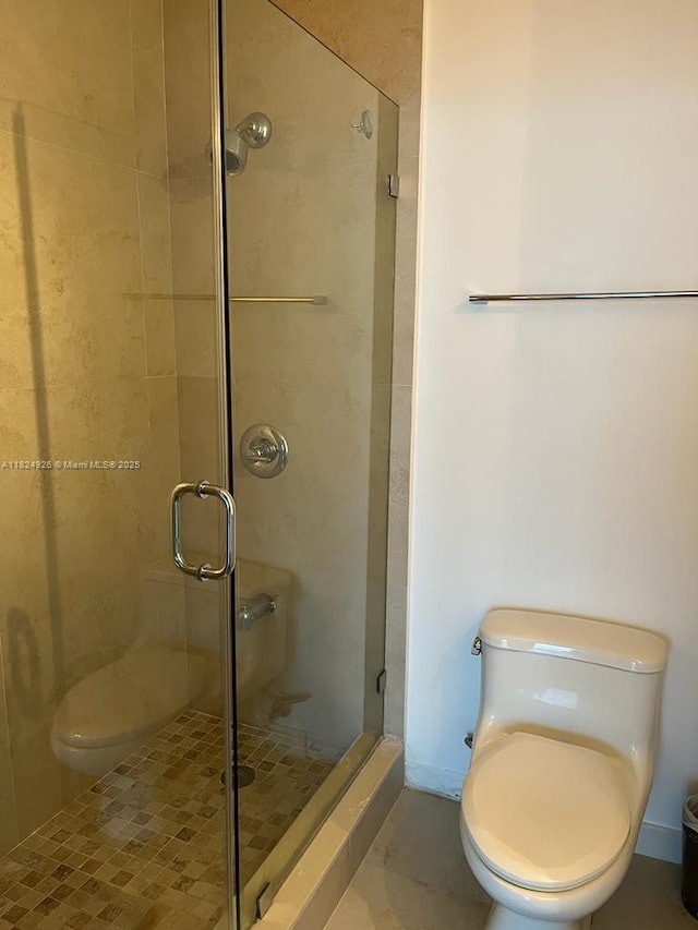 60 SW 13th St Unit 4607, Miami, FL 33130 - bathroom with toilet and a stall shower