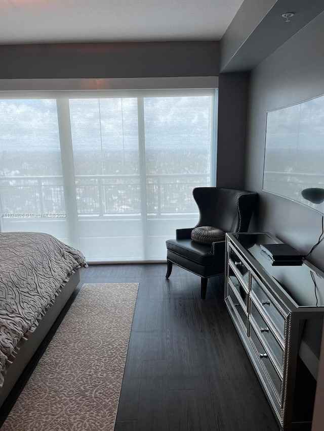 60 SW 13th St Unit 4607, Miami, FL 33130 - bedroom with dark wood-style flooring