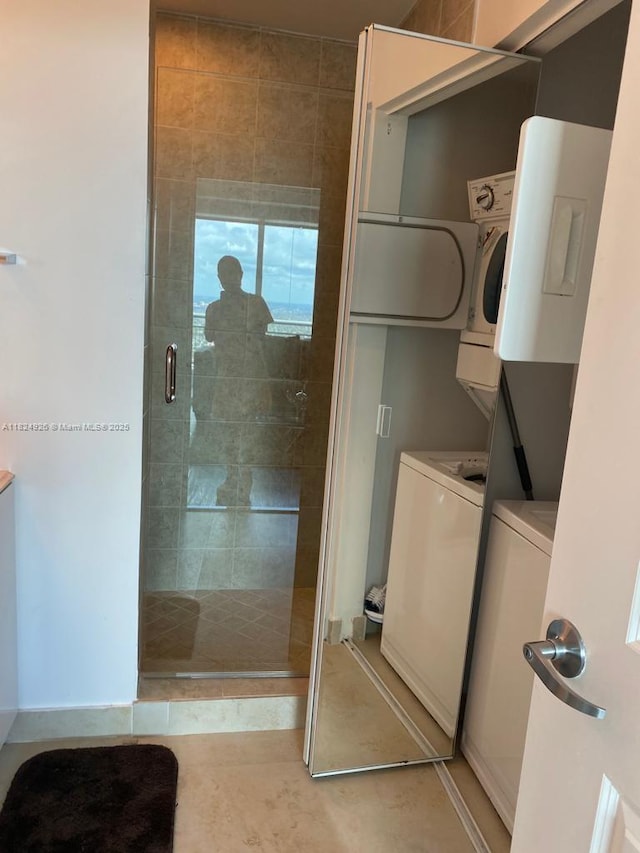 60 SW 13th St Unit 4607, Miami, FL 33130 - full bathroom with a shower stall, stacked washer and clothes dryer, and tile patterned flooring