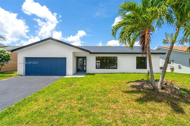7441 NW 38th Ct, Lauderhill, FL 33319 - ranch-style house featuring stucco siding, driveway, an attached garage, and a front yard