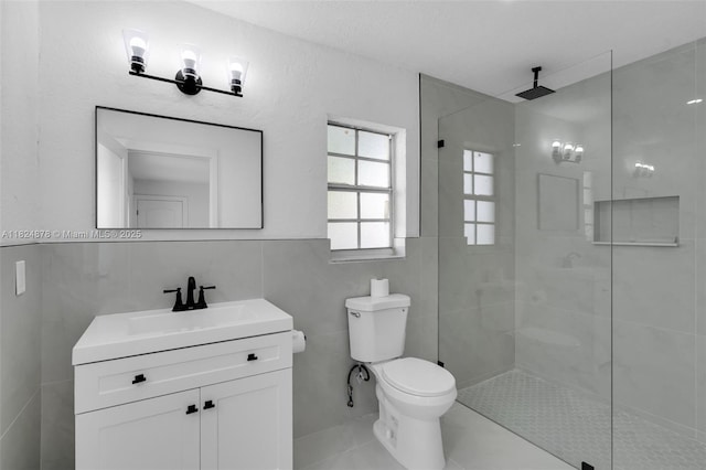 7441 NW 38th Ct, Lauderhill, FL 33319 - full bathroom featuring tile walls, vanity, a walk in shower, and tile patterned floors