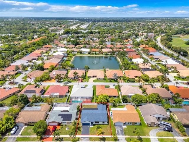7441 NW 38th Ct, Lauderhill, FL 33319 - aerial perspective of suburban area featuring a large body of water