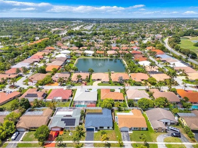 7441 NW 38th Ct, Lauderhill, FL 33319 - aerial perspective of suburban area with a large body of water