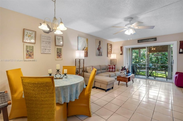 8317 Royal Palm Blvd Unit 104, Coral Springs, FL 33065 - dining room with a ceiling fan, light tile patterned floors, a chandelier, and a textured ceiling