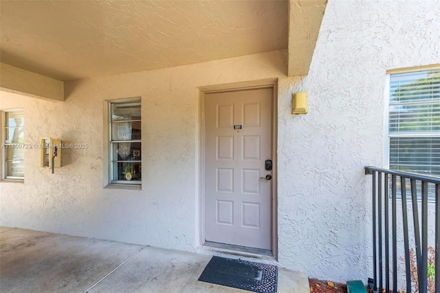 8317 Royal Palm Blvd Unit 104, Coral Springs, FL 33065 - doorway to property featuring stucco siding