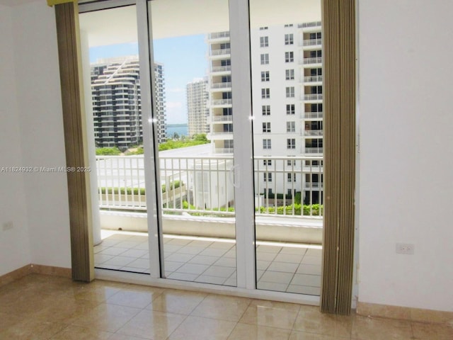 801 Brickell Key Blvd Unit 807, Miami, FL 33131 - entryway with a view of city and tile patterned flooring