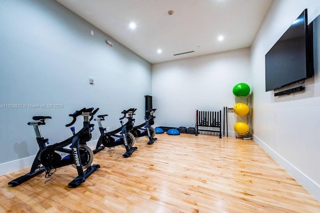 801 Brickell Key Blvd Unit 807, Miami, FL 33131 - workout area featuring wood finished floors and recessed lighting