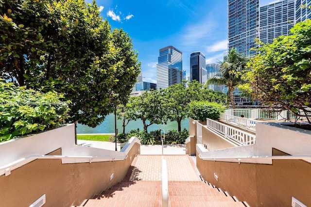 801 Brickell Key Blvd Unit 807, Miami, FL 33131 - patio / terrace featuring a skyline view and a water view