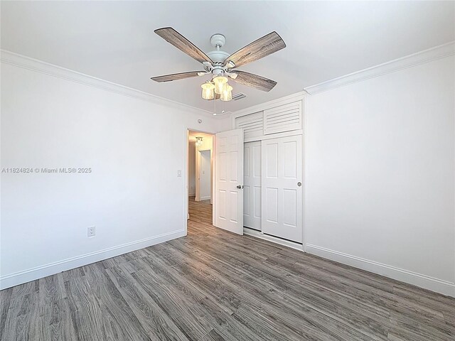 6464 Mcclellan St, Hollywood, FL 33024 - unfurnished bedroom featuring ornamental molding, wood finished floors, a closet, and ceiling fan