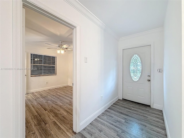 6464 Mcclellan St, Hollywood, FL 33024 - foyer featuring wood finished floors, crown molding, and a ceiling fan
