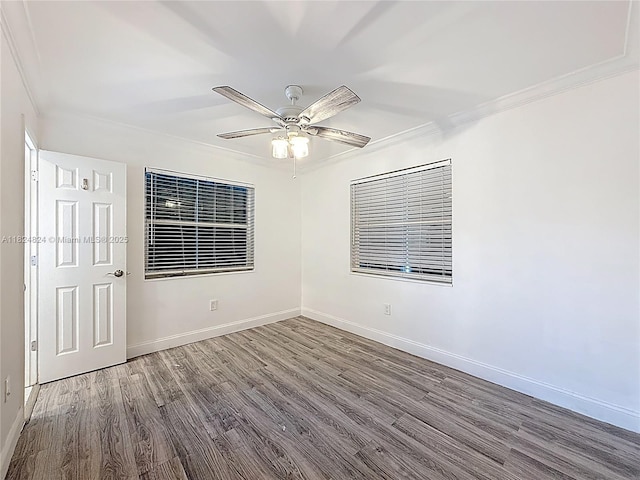 6464 Mcclellan St, Hollywood, FL 33024 - empty room with crown molding, wood finished floors, and a ceiling fan