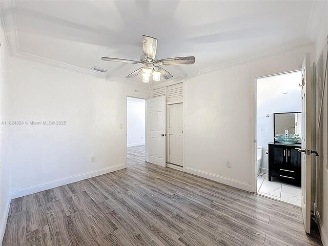 6464 Mcclellan St, Hollywood, FL 33024 - spare room with crown molding, wood finished floors, and ceiling fan