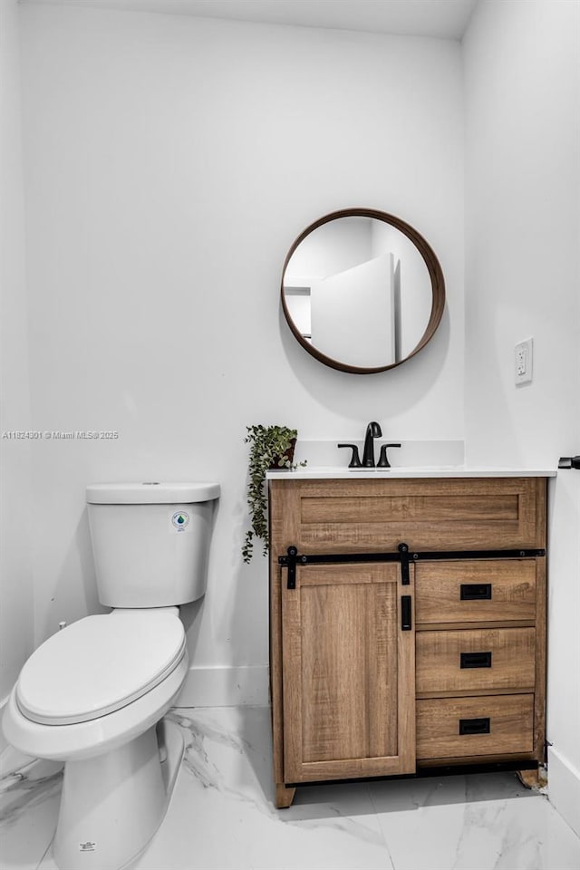 4660 W 8th Pl, Hialeah, FL 33012 - bathroom featuring marble finish flooring and vanity