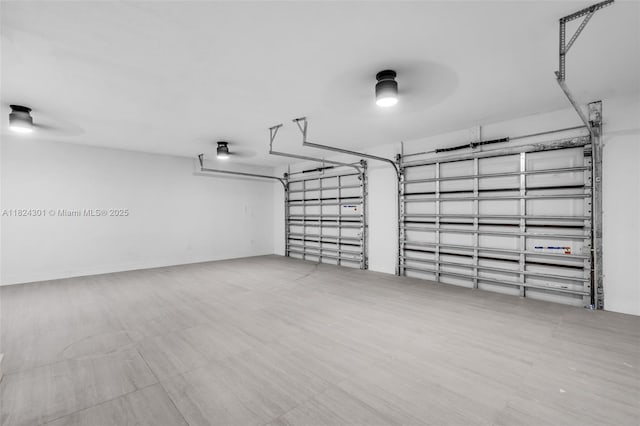 4660 W 8th Pl, Hialeah, FL 33012 - garage with a ceiling fan