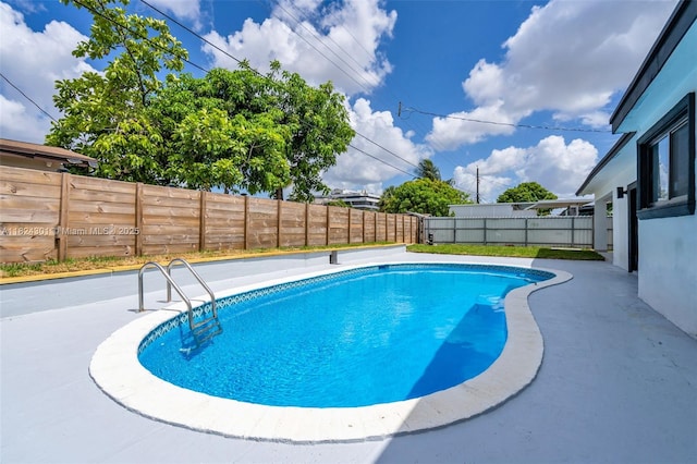 4660 W 8th Pl, Hialeah, FL 33012 - view of pool with a fenced backyard