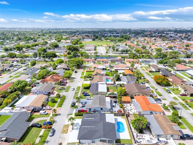 4660 W 8th Pl, Hialeah, FL 33012 - aerial perspective of suburban area with a pool area