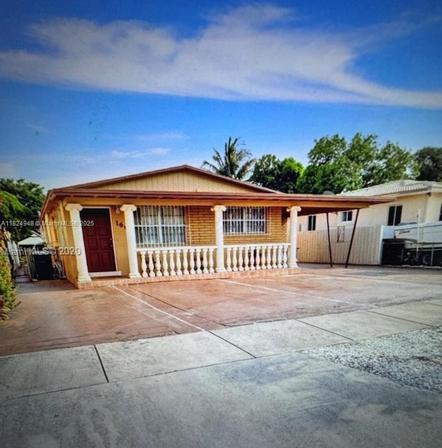166 E 16th St, Hialeah, FL 33010 - single story home featuring an attached carport