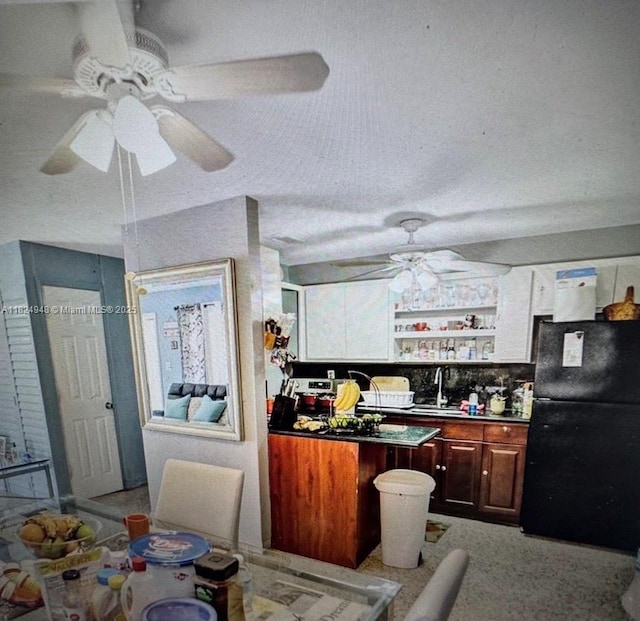166 E 16th St, Hialeah, FL 33010 - kitchen with freestanding refrigerator and ceiling fan
