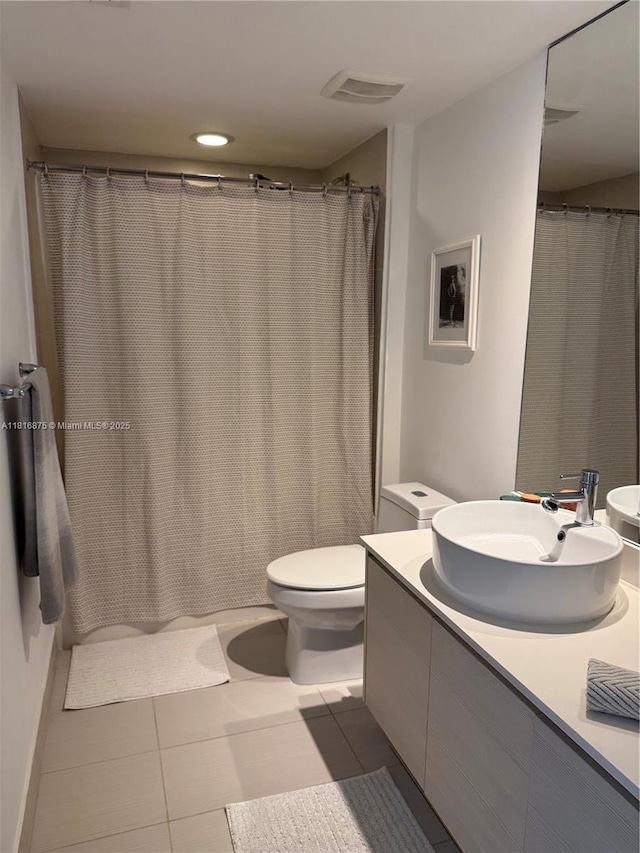 4250 Biscayne Blvd Unit 1618, Miami, FL 33137 - full bathroom with vanity, tile patterned floors, and a shower with curtain