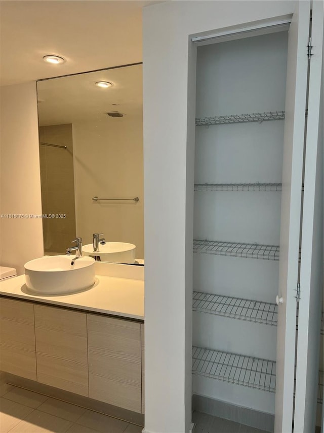 4250 Biscayne Blvd Unit 1618, Miami, FL 33137 - bathroom featuring vanity, tile patterned flooring, and recessed lighting