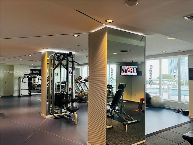 4250 Biscayne Blvd Unit 1618, Miami, FL 33137 - workout area with ornate columns and recessed lighting