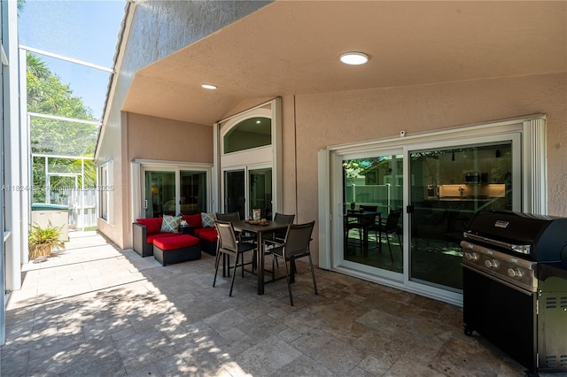 14295 NW 18th Pl, Pembroke Pines, FL 33028 - view of patio with a grill, a lanai, and outdoor lounge area
