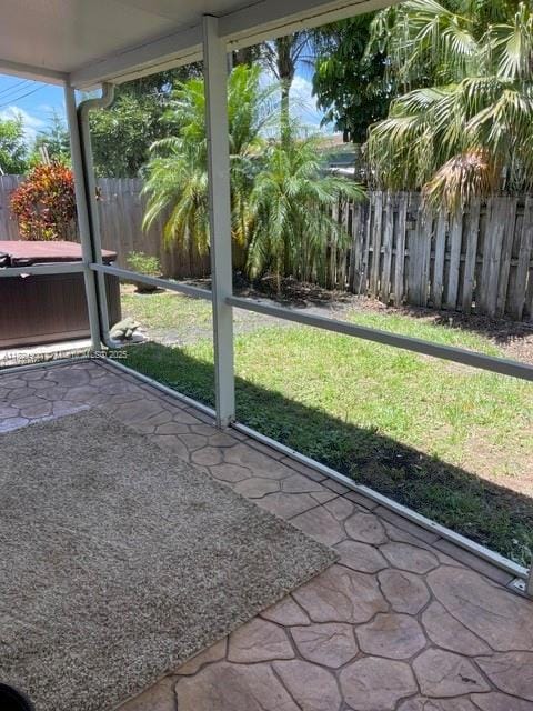 5433 NE 5th Ave, Oakland Park, FL 33334 - unfurnished sunroom with a jacuzzi