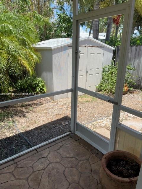 5433 NE 5th Ave, Oakland Park, FL 33334 - view of unfurnished sunroom