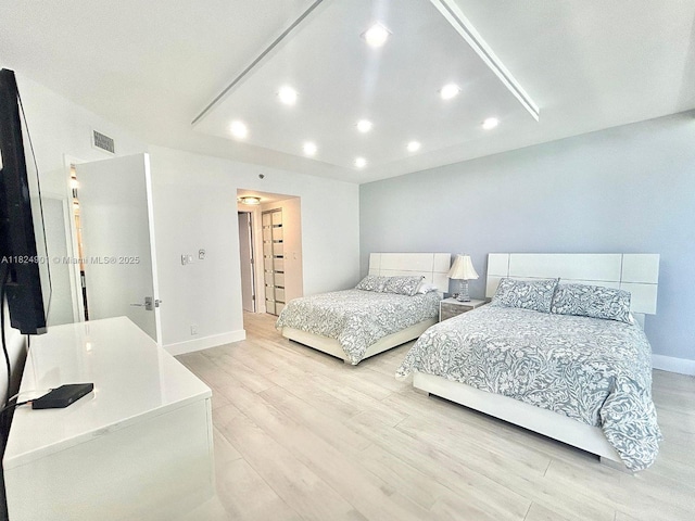 9455 Collins Ave Unit 809, Surfside, FL 33154 - bedroom with light wood-style floors and recessed lighting