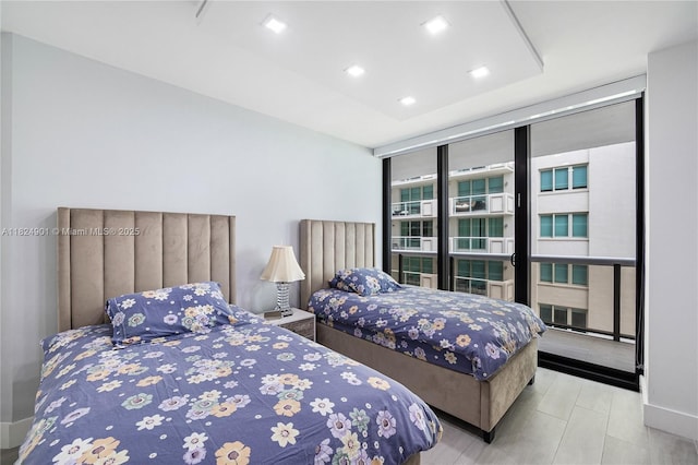 9455 Collins Ave Unit 809, Surfside, FL 33154 - bedroom featuring recessed lighting and a wall of windows