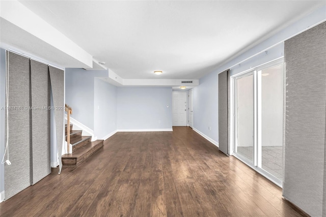 280 SW 20th Rd Unit 904, Miami, FL 33129 - unfurnished living room with wood finished floors, stairway, and a heating unit