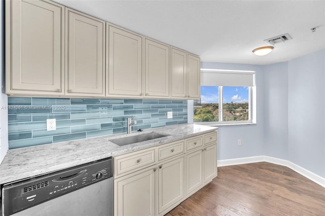 280 SW 20th Rd Unit 904, Miami, FL 33129 - kitchen with dishwasher, backsplash, wood finished floors, light stone countertops, and cream cabinetry
