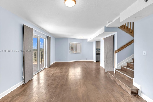 280 SW 20th Rd Unit 904, Miami, FL 33129 - unfurnished living room featuring stairs and wood finished floors