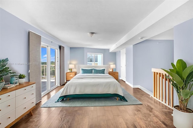 280 SW 20th Rd Unit 904, Miami, FL 33129 - bedroom featuring access to outside and wood finished floors