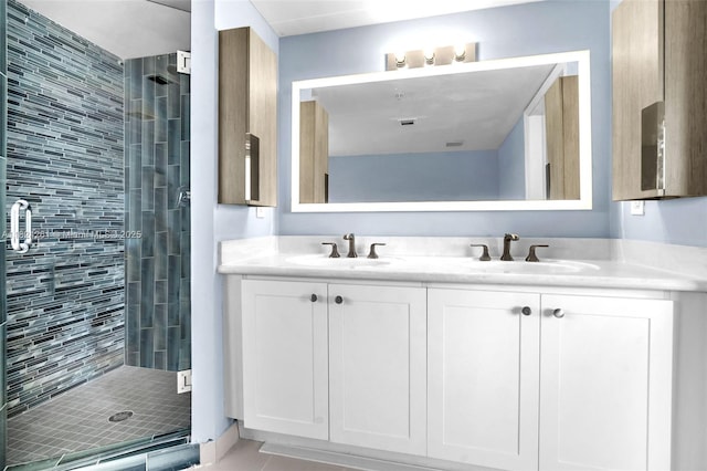 280 SW 20th Rd Unit 904, Miami, FL 33129 - full bath featuring double vanity, a stall shower, and tile patterned flooring
