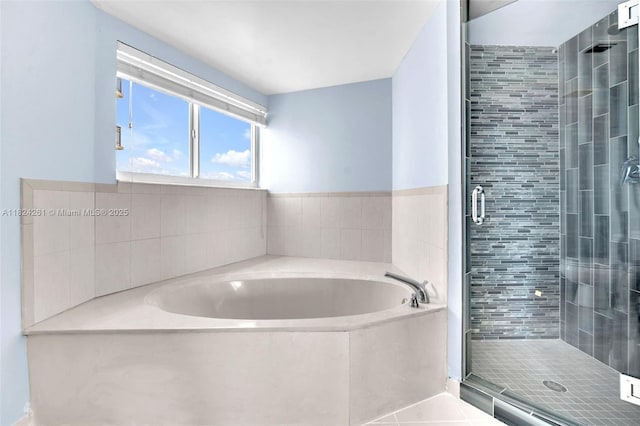 280 SW 20th Rd Unit 904, Miami, FL 33129 - full bathroom with a bath, a stall shower, and tile patterned flooring